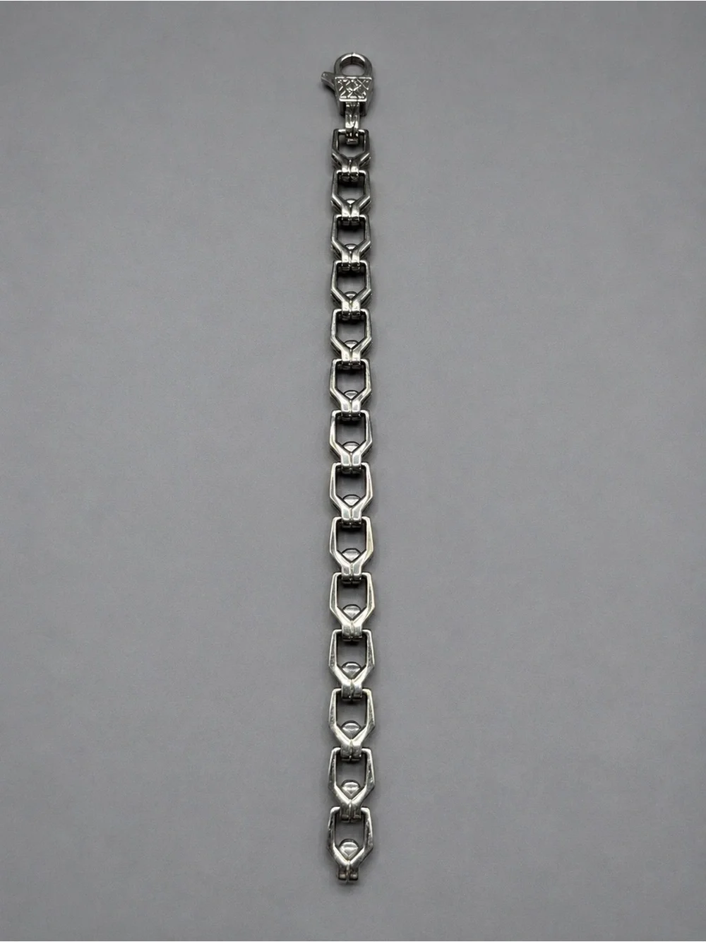 Silver Tone Linked Bracelet with Heart Motif